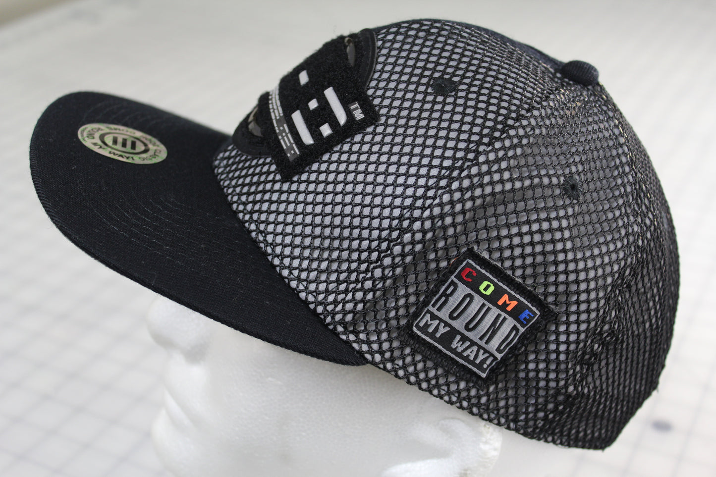 E-D Brotherhood - Half & Half Baseball Cap (Flat Visor) Black w. 1/2 Reflective Grey Mesh Overlay (Half Extraordinary Half Amazing)